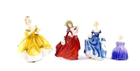 Four Royal Doulton figures, comprising The Last Waltz HN2315, Autumn Breezes HN1934, Hilary HN2335, and Marie HN1370.