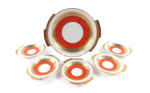 An early 20thC Hutschenreuther porcelain hors d'oeuvre's set, of twin handled circular form decorated with bands of gold and red, comprising one large and five small dishes, printed mark, large dish 22cm Dia.