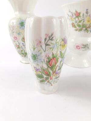 A group of Aynsley porcelain decorated in the Wild Tudor pattern, comprising four vases and three jars and covers, together with a pin dish decorated in the Cottage Garden pattern. (8) - 2