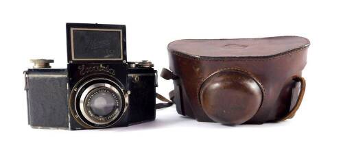 An Ihagee Exakta Model B camera, No 422266, with a Carl Zeiss 50mm F2:2.3 lens, No 1547458, leather cased.