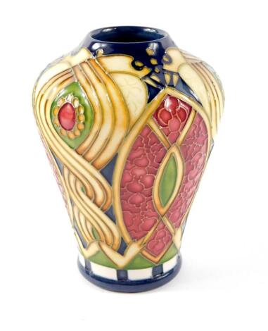 A Moorcroft pottery vase decorated in the Staffordshire Gold pattern, of baluster form, circa 2010, impressed and painted marks, boxed, 11cm H.