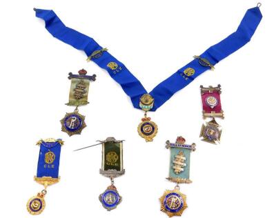 Five RAOB silver gilt and enamel jewels, Willoughby Lodge, No 4172, awarded to Bros. Raymond Gaunt, Charles Moisey, and Charles Mercer, together with a Willoughby Lodge sash with brass and enamelled jewel suspension. (6)