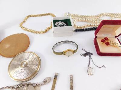 Silver and costume jewellery, including a cameo pendant, crystal brooch and earrings, beads and necklaces, compacts, and gold plated chains. (qty) - 4