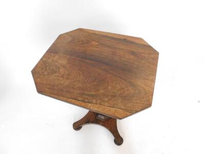 A Regency rosewood occasional table, the octagonal top raised on an octagonal column and quatrefoil base, on compressed bun feet, 71cm H, 57cm W, 45.5cm D. - 2