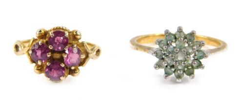 A 9ct gold and amethyst four stone ring, size O/P, 2.9g., and a further gem set ring. (2)