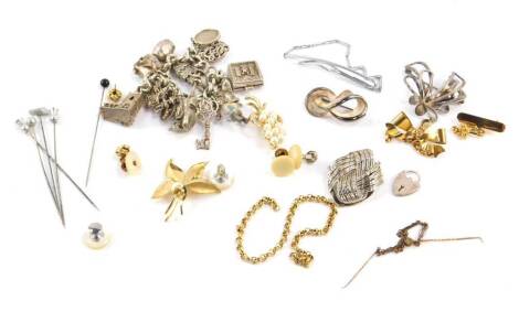 Silver and costume jewellery, including a silver curb link charm bracelet with sixteen charms as fitted, hat pins, brooches, etc. (qty)