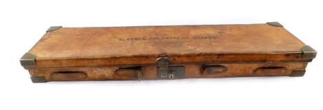 A leather and brass bound gun case, Army & Navy CSL, Gun Department, 117 Victoria Street, Westminster SW, named to S. Earle, Coldstream Guards, 84cm W. Captain Sidney Earle, Coldstream Guards was killed in action at the Battle of Modder River, November 2