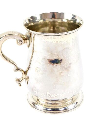 A George II silver tankard, of baluster form, with S scroll handle, initialled engraved, Richard Gurney and Thomas Cook, London 1760, 11.46oz.