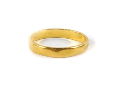 A 22ct gold wedding band, size L, 2.7g.