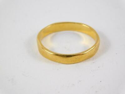 A 22ct gold wedding band, size L, 2.7g. - 2