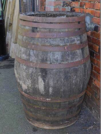 An oak and iron bound barrel, 125cm H.