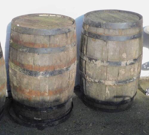 Two oak and iron bound barrels, 88.5cm H.