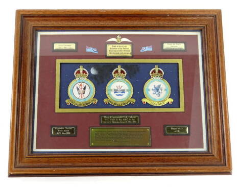 A limited edition Guy Gibson memorial plaque, with crests, mottos and badges, No. 2 of 50, signed verso by Ruth Gibson (sister-in-law) and J.L. Stiles (sister), dated stamped 17th May 1992, 40cm x 50cm (incl. frame).