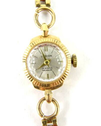 A Legion ladies wristwatch, with small circular watch head, with gold framed border, on three row bracelet, stamped 9c, 18cm long overall, 12.4g all in.