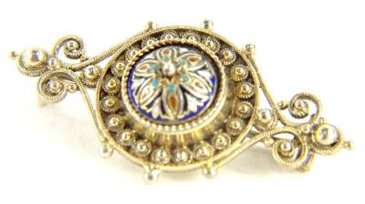 An Eastern bar brooch, with filigree design borders, and central raised enamel domed pattern, with central star set with blue, white, turquoise and orange enamel, stamped to rear 830, 4cm W, boxed, 16.1g all in.