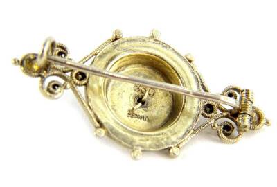 An Eastern bar brooch, with filigree design borders, and central raised enamel domed pattern, with central star set with blue, white, turquoise and orange enamel, stamped to rear 830, 4cm W, boxed, 16.1g all in. - 2