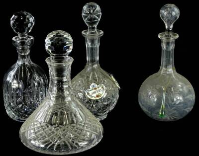 Four decanters and stopper, to include a ships decanter, and a Victorian decanter, engraved with ferns.