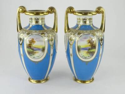 A pair of Noritake type Japanese porcelain two handled vases, each decorated with river landscapes within elaborate gilt and turquoise coloured borders, unmarked, (gilding AF), 33cm H. - 2