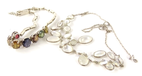 Two items of modern costume jewellery, comprising a silver and paste stone set bracelet, and an imitation moonstone and silver plated necklace. (2)