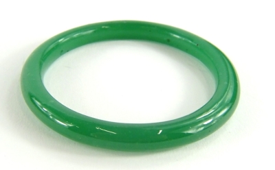 An imitation jade bangle, of pale green colour, 9cm dia, boxed.