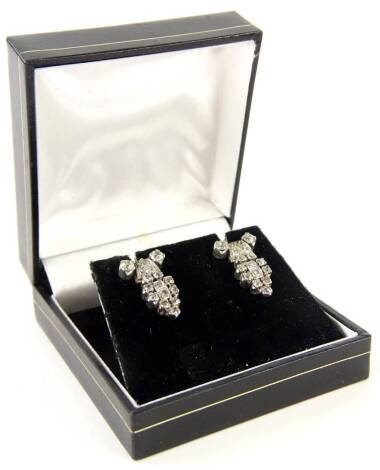 A pair of Art Deco style diamond drop earrings, with tiered design earring, with old cut diamonds, in white metal, unmarked, 1.5cm H, with butterfly backs, 3.8g all in.