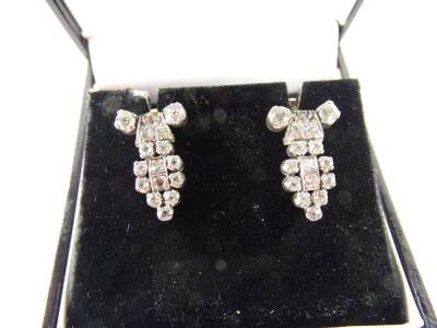 A pair of Art Deco style diamond drop earrings, with tiered design earring, with old cut diamonds, in white metal, unmarked, 1.5cm H, with butterfly backs, 3.8g all in. - 2