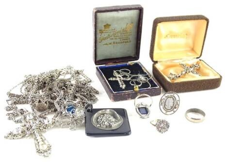 Various silver and other costume jewellery, to include silver plated chains, a silver and cz set cluster ring, a modern elephant pendant and chain, silver cherub, crucifix pendant, each stone set, dress rings, and a silver and marcasite dress ring, etc. (