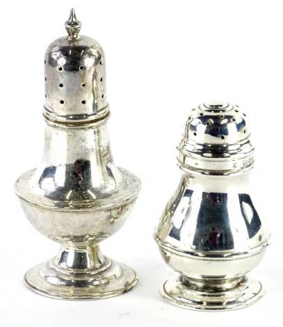 A George V silver baluster shaped pepper pot, London 1899, and another pepper pot, 2oz. (2)