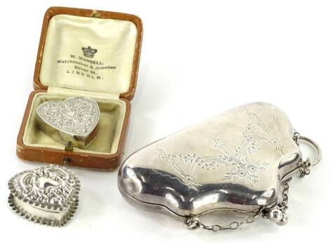 A collection of small silver, etc., to include a heart shaped embossed pill box, an Edwardian silver plated purse, and heart shaped ladies lighter. (AF)