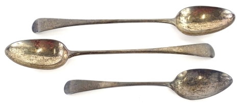 A pair of George III silver Old English pattern serving or basting spoons, London 1808 and 1809, 5½oz, and a silver Old English pattern dessert spoon, 1¾oz. (3)