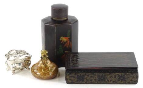 A decorative glass scent bottle with brass mounts and glitter inclusions, an Art Nouveau silver plated trinket box, an oriental lacquer tea caddy and a lacquer cigarette box. (4)