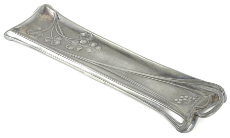 A WMF Art Nouveau pewter two handled pen tray, decorated with flowers, etc., 27cm W.