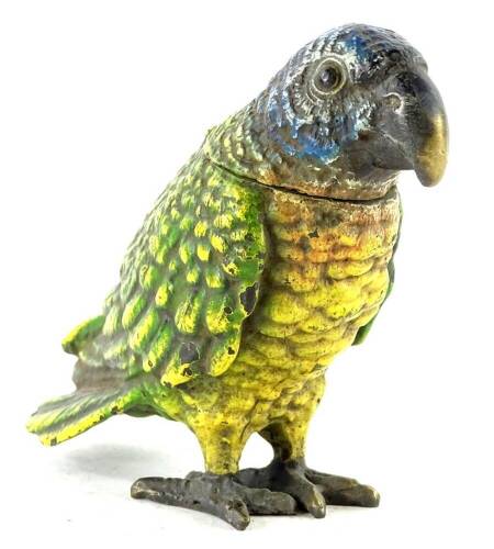 A cold painted bronze model of a parrot, the hinged lid revealing a recess, possibly for an inkwell, 9cm H.