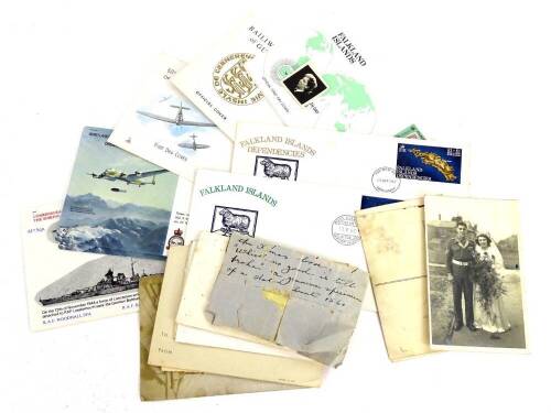 A collection of postcards, first day covers, etc.