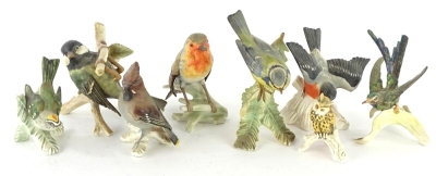 A collection of Goebel ceramic birds, to include a Robin, Blue Tit, etc.