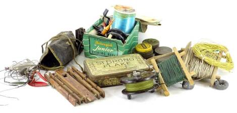 Miscellaneous fishing equipment, to include an Alcock area light Bakelite reel, other reels, accessories, etc.