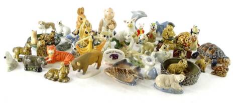 A collection of Wade Whimsies, novelties etc., to include Rupert The Bear, a baby and teddy bear, matt glazed animals, etc.