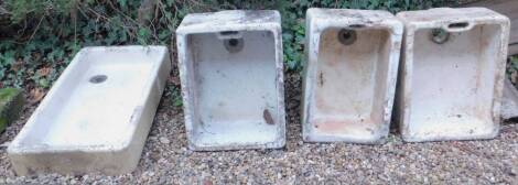 Four white glazed Belfast sinks. (AF)