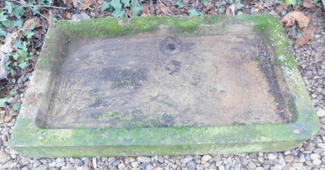 A hewn stone sink, 89cm W.