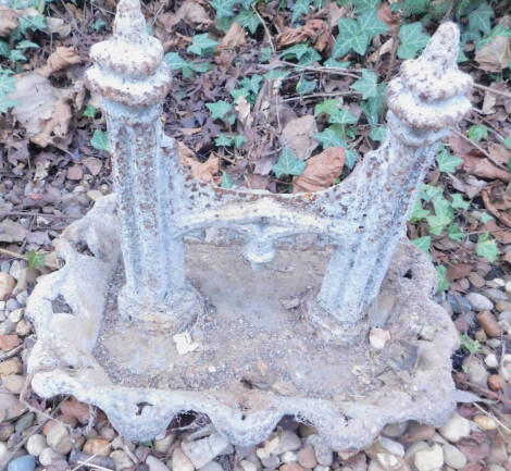 A Victorian Gothic style cast iron boot scrape, 39cm W.