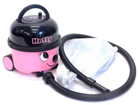 A pink Hetty numatic vacuum cleaner.