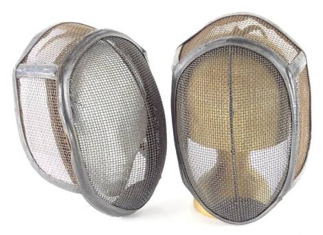 A pair of fencing masks and two fencing related photographs, relating to a Mrs Sue Thompson, etc.