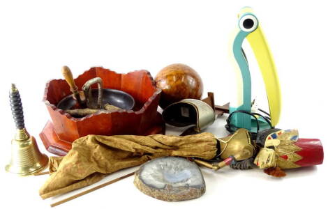 Miscellaneous items, to include a stereo viewer, an Eastern puppet, turned yew globe or ball, brass bell, nutcracker, small jardiniere, fossils, etc.