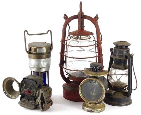 Miscellaneous lamps, to include Hailwood and Ackroyd Limited type A.D.C.2NO miners lamp, blue glass cover, aluminium label to base, a bicycle type lamp, small lantern and two paraffin type lamps. (5, AF)