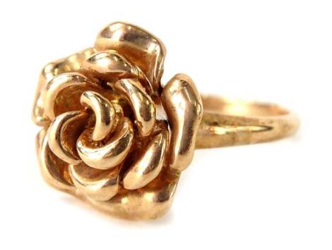 A 9ct rose gold rose dress ring, with central design of rose, ring size U½, maker QVC, 5g all in.