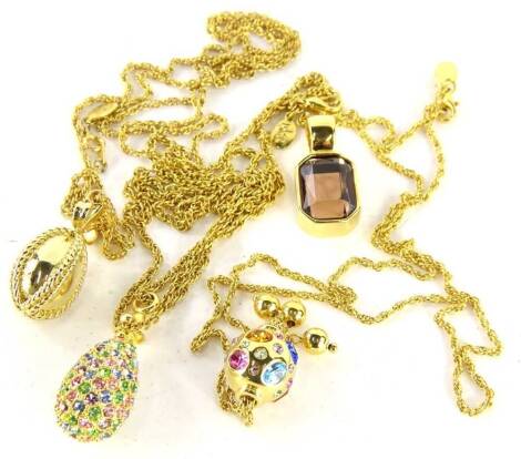 Four items of modern Joan Rivers jewellery, comprising an octagonal pendant, multi coloured paste stone set ball pendant, multi stone tear drop pendant and a pendant. (4)