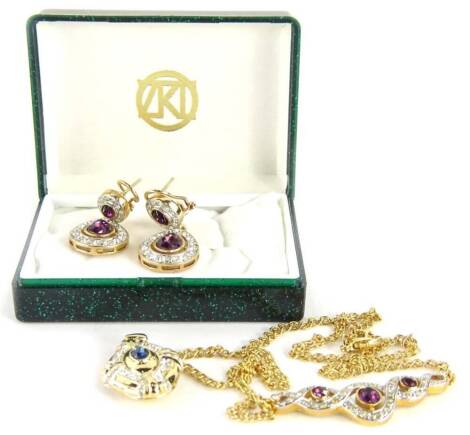 A group of modern Art Deco style jewellery, to include a locket set with white and blue stones, and a necklace and earring set, with white and purple stones. (3)