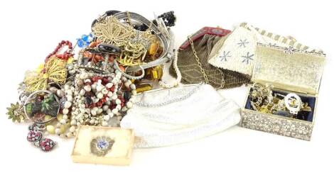 A quantity of jewellery and evening purses, to included beaded evening bags, modern military badges, beaded necklaces, delft brooch, silver plated trinket box, etc. (a quantity)