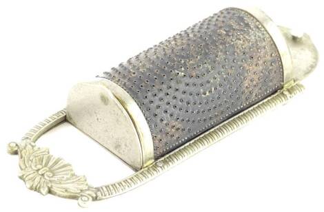 A 19thC silver plated nutmeg grater, with hinged covers to each end in the casing, decorated with gadroons, shell, leaves, etc., 11cm H.