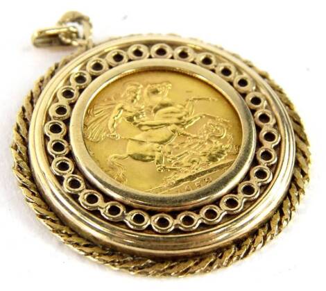 An Elizabeth II half gold sovereign pendant, the coin dated 1958, in 9ct gold frame, with twist design outer border and tiny circle set inner border, 13.6g all in.